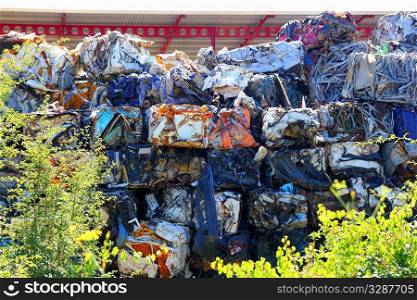 scrap metal scrap-iron junk outdoor stacked rows