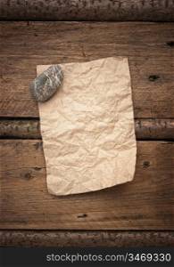 scrap of paper on a wooden background