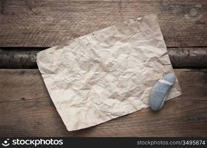 scrap of paper on a wooden background