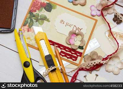 scrapbook background. Card and tools with decoration