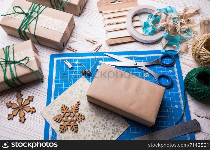 scrapbook background. christmas - girl packs gift