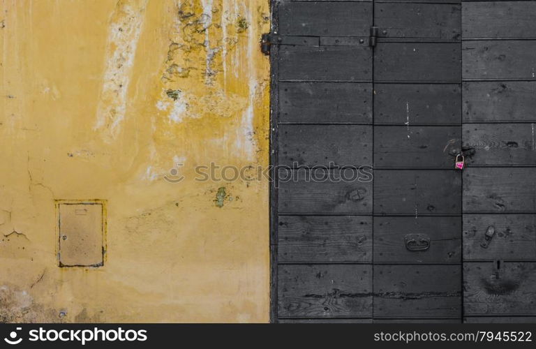 Scraped wall and a wooden door