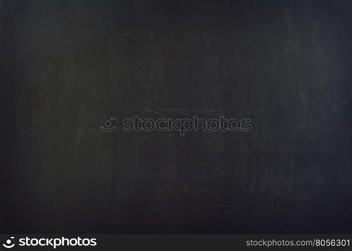 Scratchy blackboard in close-up. Copyspace.