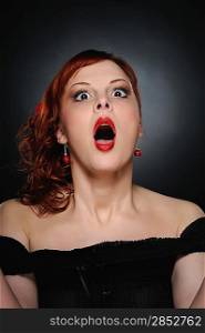 Screaming attractive redhead woman