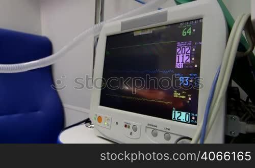 Screen of multiparameter ambulance patient monitor indicates critical high blood pressure
