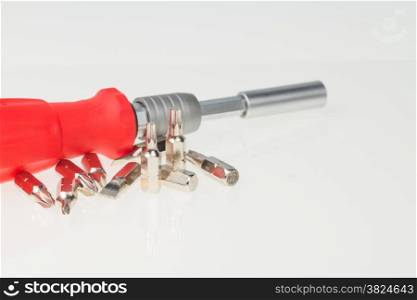 Screwdriver and torx bits on isolated white background