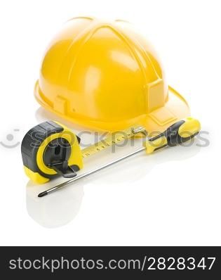 screwdriver, tapeline and helmet