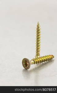 screws tool at metal background texture