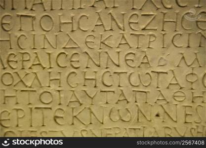 Script carved in stone in Capitoline Museum, Rome, Italy.