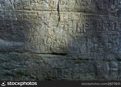 Script carved on a rock
