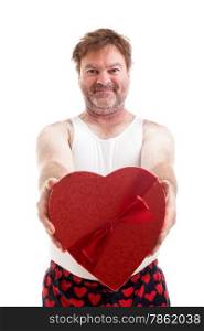 Scruffy middle aged man giving you a heart shaped box of candy for Valentines Day. Isolated on white