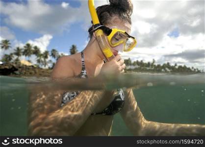 Scuba diving with underwater view.