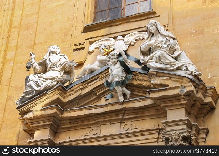 Sculpture composition on building of Court of Justice on Piazza San Firenze, Florence, Italy
