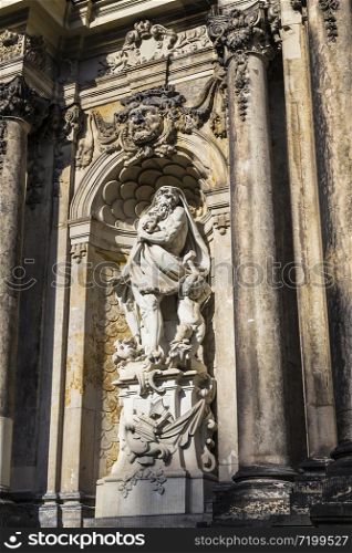 Sculpture in the niche, decorating the gate of Zwinger. Dresden. Germany