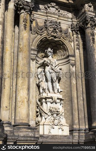 Sculpture in the niche, decorating the gate of Zwinger. Dresden. Germany
