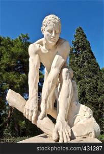 Sculpture of an athlete in front of the old olymilmpic village in Athens