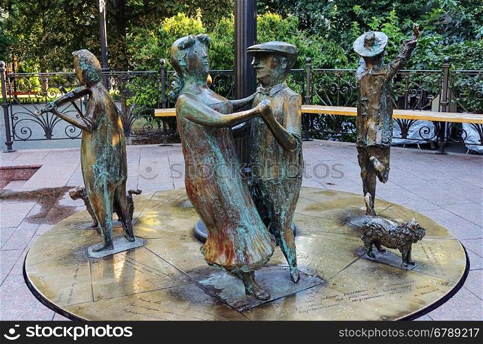 Sculpture of dancing people in City Garden of Odessa, Ukraine
