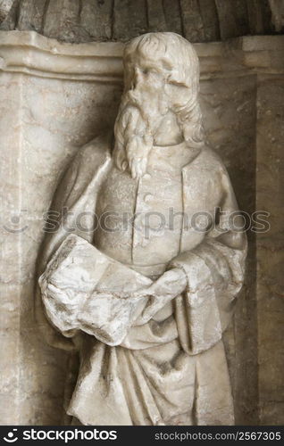 Sculpture of man on exterior of Mosteiro dos Jeronimos in Lisbon, Portugal.