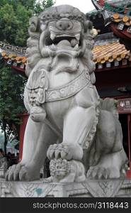 Sculpture of stone lion near buddhist temple in Chengdu, China