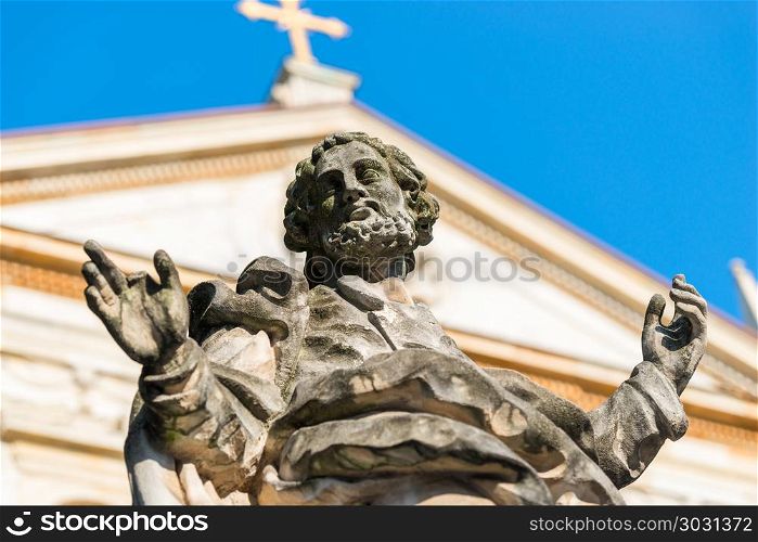 sculpture of the apostle against the background of the Catholic . sculpture of the apostle against the background of the Catholic church in Krakow