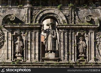 Sculpture of the Apostle Santiago and his disciples. East facade of Santiago de Compostela Cathedral
