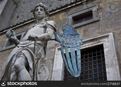 sculpture of the arcangel standing in the courtyard of Castel Sant Angelo in Rome