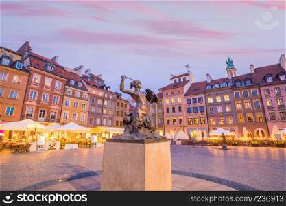 Sculpture of the Warsaw Mermaid (This mermaid statue was made in 1855) on the Old Town Market square in Poland
