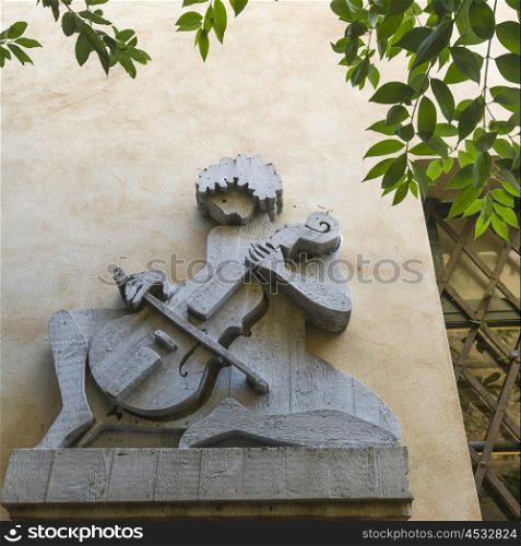 Sculpture on wall, Orvieto, Terni Province, Umbria, Italy
