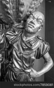 sculpture slave man carrying a pitcher