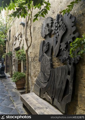 Sculptures on wall, Orvieto, Terni Province, Umbria, Italy