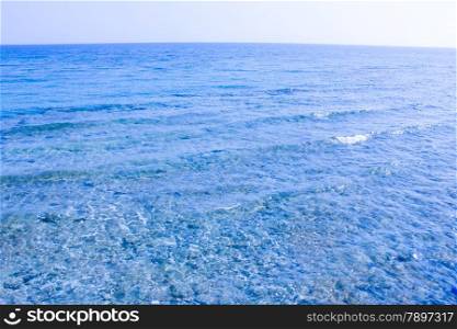 Sea background. Blue water texture.