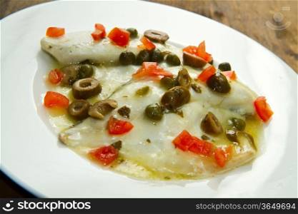 sea bream fillet with tomatoes, green olives and capers