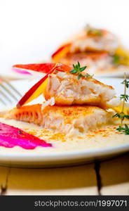 sea bream orata fillet butter pan fried with fresh peach prune and dragonfruit slices thyme on top