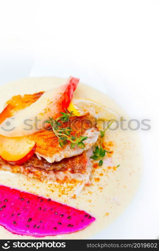 sea bream orata fillet butter pan fried with fresh peach prune and dragonfruit slices thyme on top