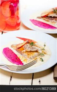 sea bream orata fillet butter pan fried with fresh peach prune and dragonfruit slices thyme on top