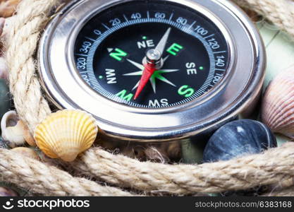 Sea compass and seashells. Sea compass on a background with ocean shells