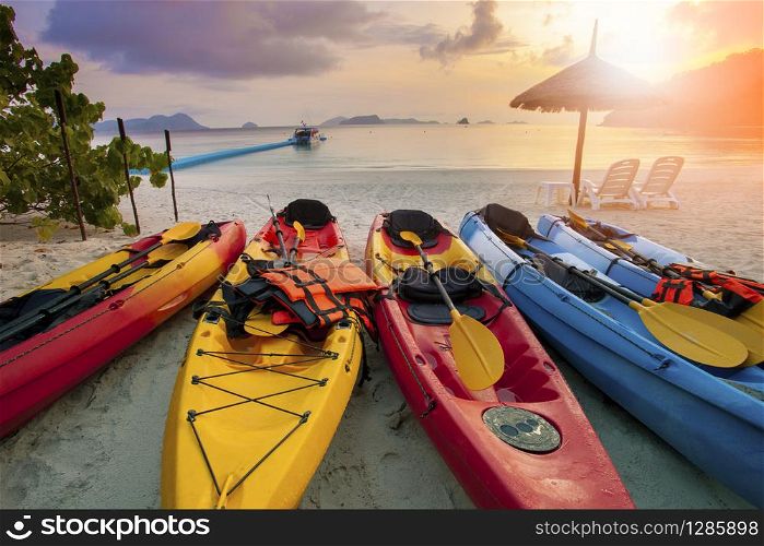 sea kayak on sand beach against beautiful sun rising sky at nyaung oo phee island andaman sea myanmar