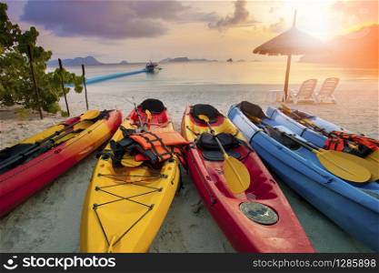 sea kayak on sand beach against beautiful sun rising sky at nyaung oo phee island andaman sea myanmar