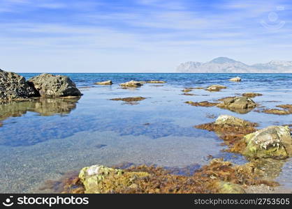 Sea landscape. A sea bay with picturesque mountains