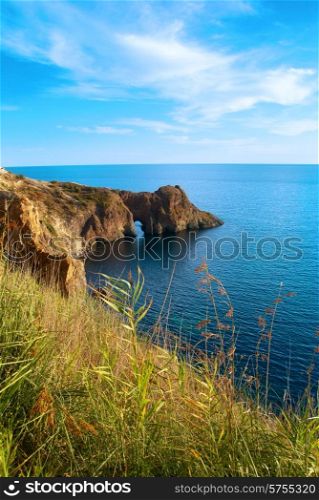 Sea landscape with grotto in the rock