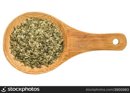 sea lettuce seaweed flakes - top view of a wooden spoon isolated on white