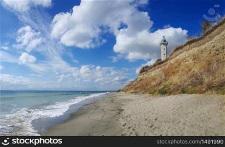 Sea lighthouse and beautiful empty beach on the bulgarian Black Sea coast