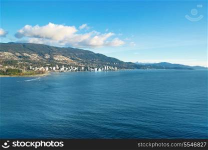 Sea near Vancouver Canada with city on the other bank