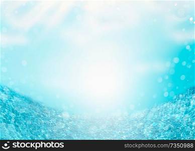 Sea or ocean water at blue sky background with sunbeam. Summer background