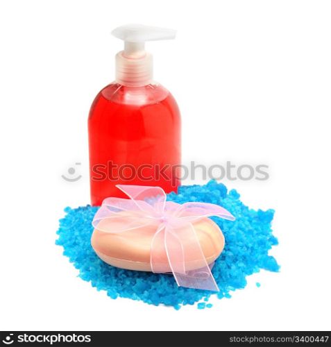 Sea salt and soap isolated on a white background.