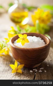 sea salt and yellow flowers for spa