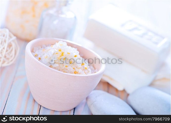 sea salt in bowl and on a table
