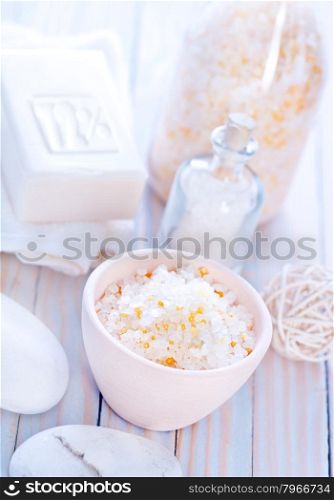 sea salt in bowl and on a table