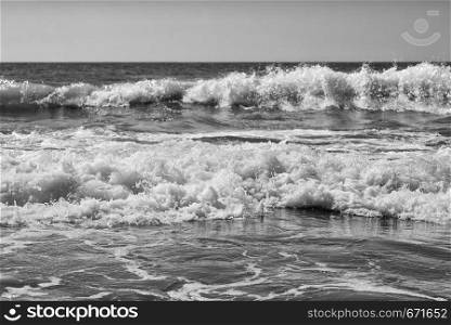 Sea, sand ,sky, waves and summer day. Beautiful tropical beach. Beautiful beach and tropical sea. Seacoast. Black and white photo. Sea sand sky and summer day. Beautiful tropical beach. Beautiful beach and tropical sea. Seacoast