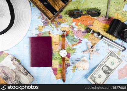 sea shells banknotes passport accessories world map